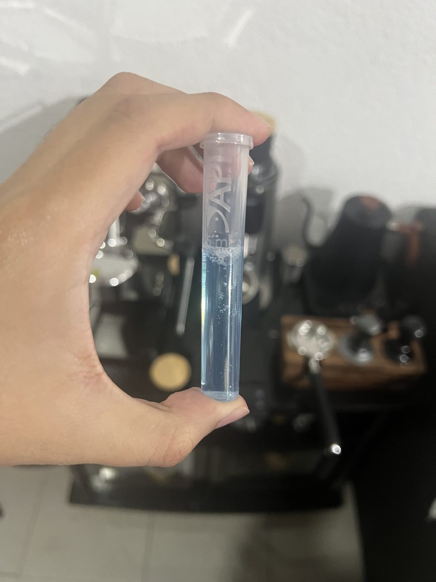 KH test tube with blue water at start of test